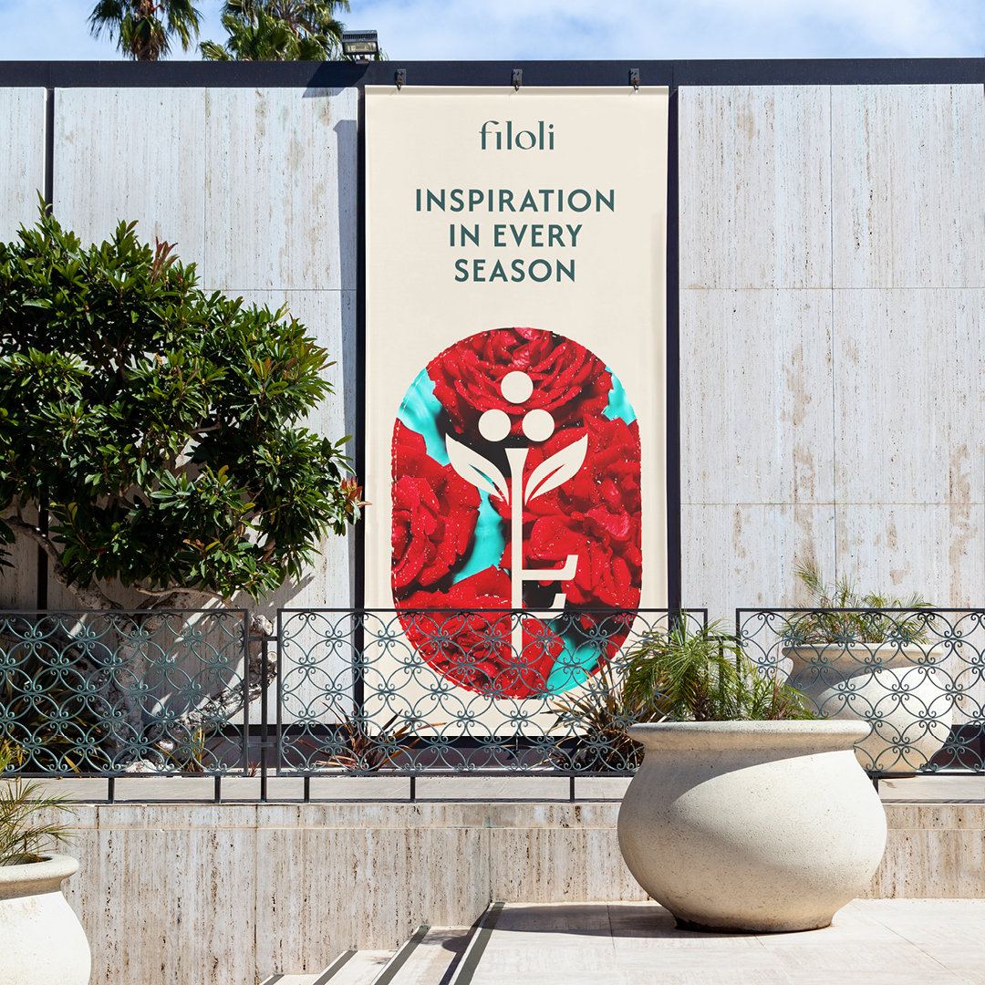 Street pole banners with 'Inspiration in Every Season' and a floral key motif