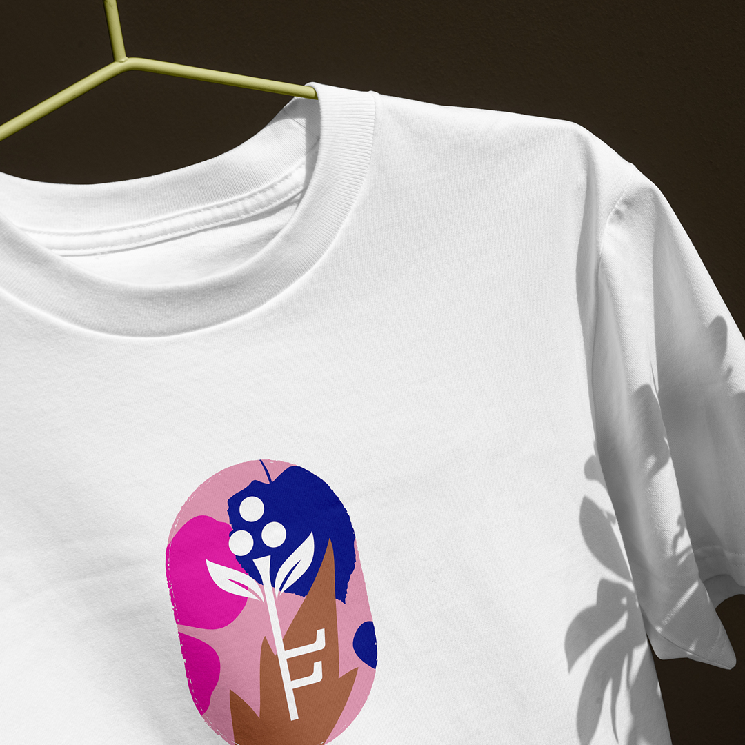 White t-shirt with a circular Filoli floral emblem