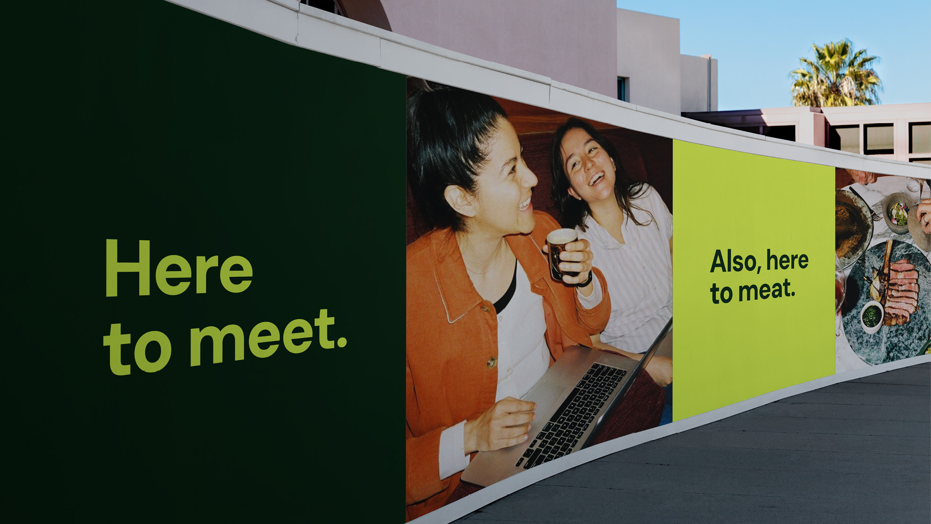 Flipside campaign billboard with the line 'Here to meet' beside friends laughing